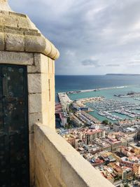 Castillo de santa bárbara alicante high angle view of townscape by sea against sky