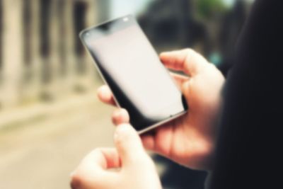 Close-up of person using mobile phone