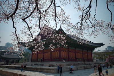Group of people in front of building