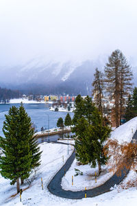 View of saint moritz lake in winter snow, in vertical format