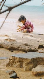 Rear view of woman at beach