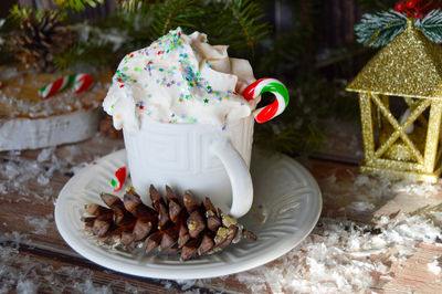 Close-up of christmas decorations on table