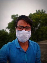 A man with surgical face mask