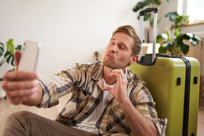 Young man using mobile phone