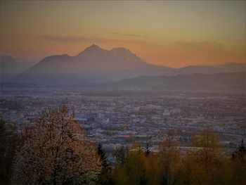 High angle view of townscape against sky during sunset