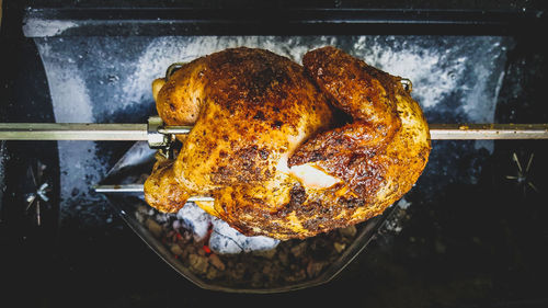 Close-up of meat on barbecue grill