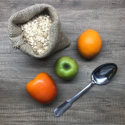 High angle view of orange fruit on table