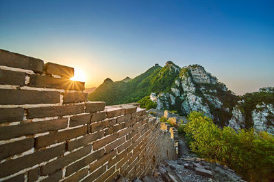 Great wall of china on mountain against clear sky