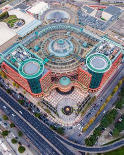 High angle view of illuminated building in city