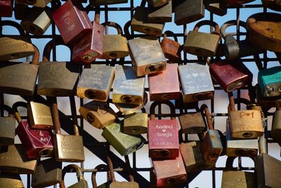 Full frame shot of padlocks hanging on railing