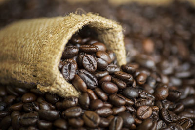 Close-up of roasted coffee beans with burlap