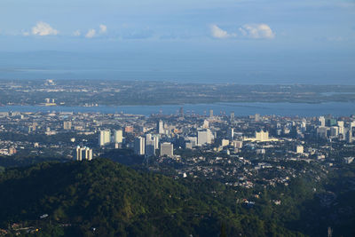 High angle view of buildings in city against sky