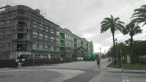 Road along buildings in city