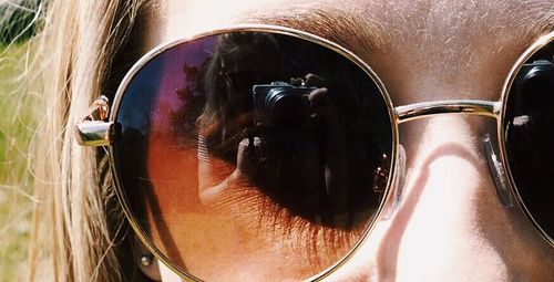 Reflection of woman in mirror