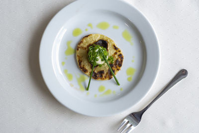 High angle view of breakfast served on table