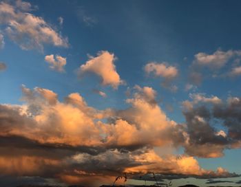 Low angle view of clouds in sky during sunset