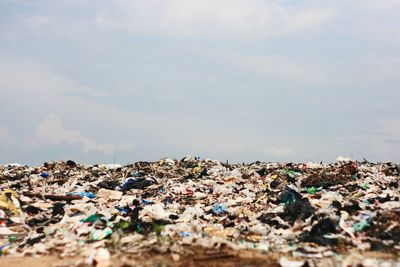 Close-up of garbage against sky