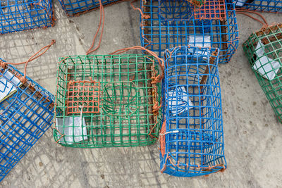 High angle view of fishing net in cage