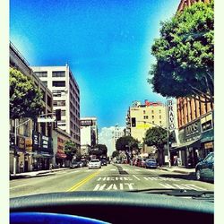 Cars on road in city