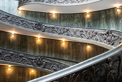 Low angle view of illuminated staircase in building