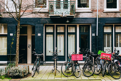 Bicycle parked in front of building