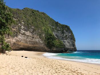 Scenic view of sea against clear blue sky