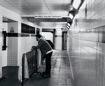 Rear view of man in subway