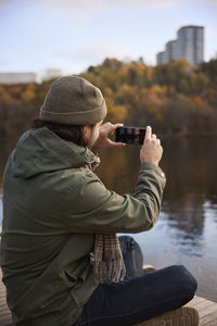 Man taking picture with cell phone