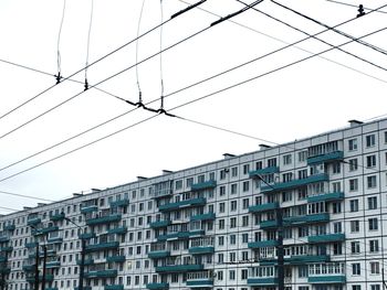 Low angle view of buildings against clear sky