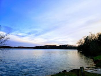 Scenic view of lake against blue sky