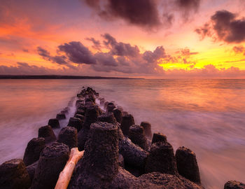 Scenic view of sea against sky during sunset