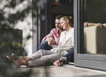 People sitting by window