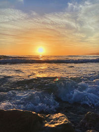 Scenic view of sea against sky during sunset