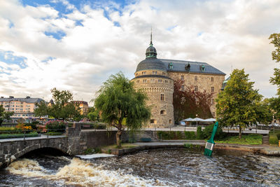  arched bridge over the river against the castle