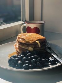 Close-up of breakfast in plate on table