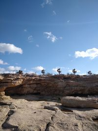 Rocks on land against sky