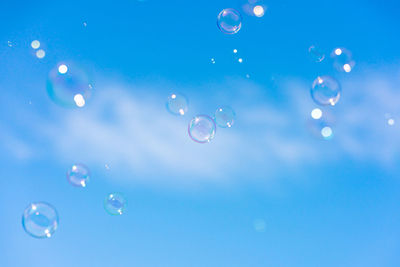 Bubbles against blue sky