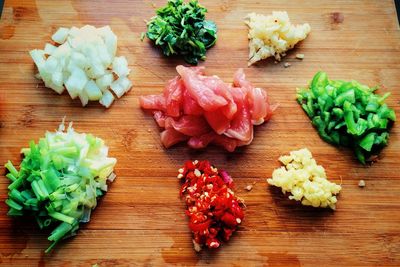 High angle view of ingredients arranged on wooden table