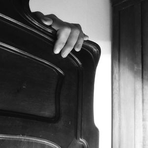 Close-up of hands playing piano