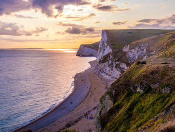 Scenic view of sea against sky during sunset