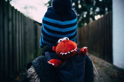 Close-up of a man holding toy