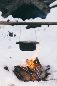 Close-up of camp fire in the snow