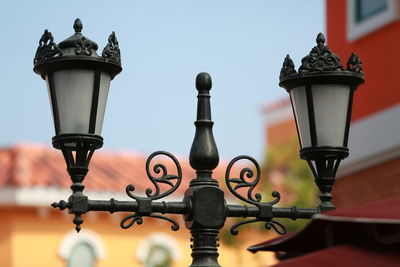 Close-up of street light against sky