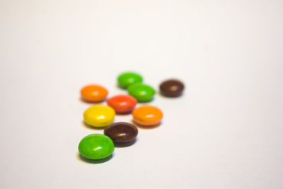 High angle view of multi colored balls on table