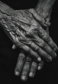 Close-up of human hands in old age