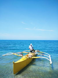 Nautical vessel on sea against sky