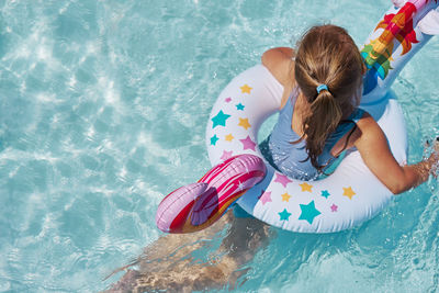 High angle view of girl in swimming pool