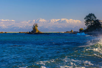 Scenic view of sea against clear sky