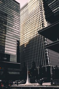 Low angle view of modern buildings in city