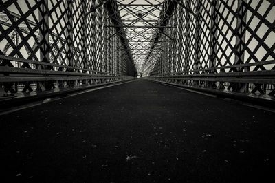 Road on bridge against sky